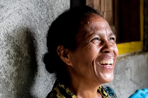 Timorese woman laughing